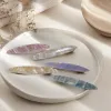 Colorful shell-patterned hair clips are fashionable and simple women's headwear accessories details Picture